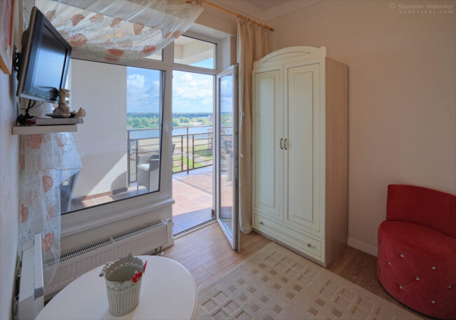 interior of the house, small room with beautiful view, classical design in pastel colours. property photography