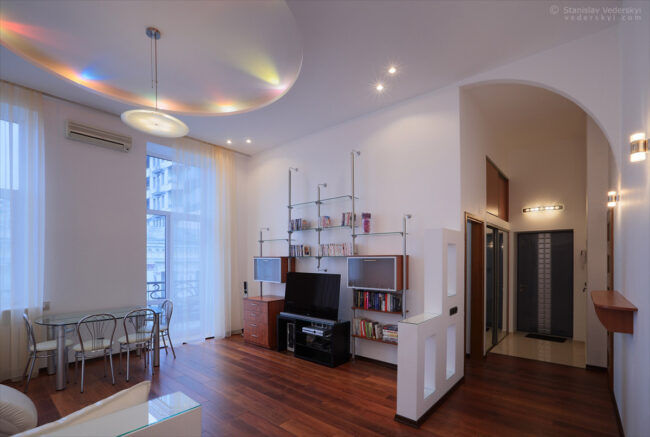 interior of the spacious modern apartments with high ceiling property photography