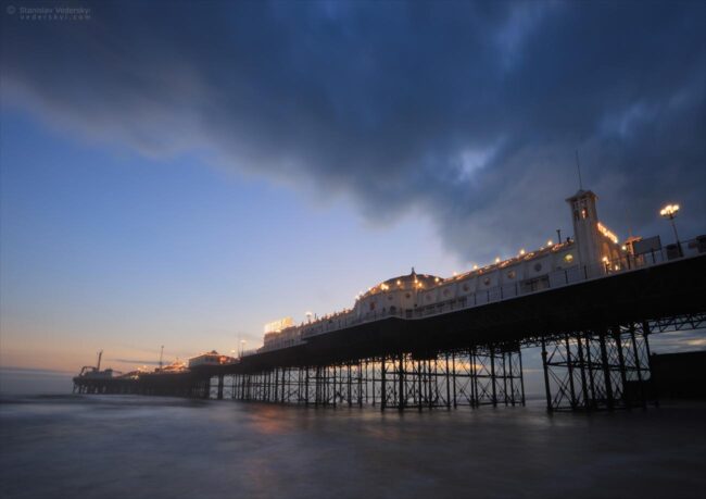 Brighton pier at dramatic sunset time
