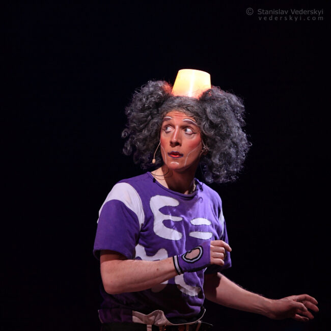 artist clown performing in ice show