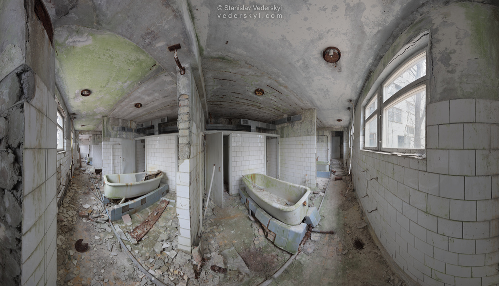 Pripyat-Sanatorium-1-1000 Chernobyl zone Multirow panoramic photograph of derelict room with baths inside decayed sanatorium in abandoned Pripyat ghost town of Chernobyl exclusion zone.