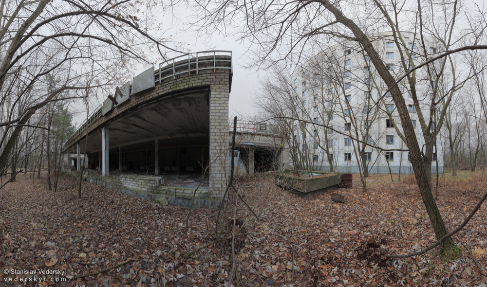Pripyat-Small-Store-2-1000 Chernobyl zone Multirow panorama shot outside of small derelict grocery store in abandoned Pripyat ghost town, Chernobyl zone of alienation, Ukraine.