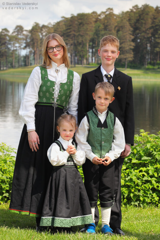 Family photo children after confirmation in the park in bunad, Sarpsborg