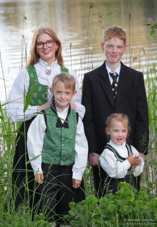 Family photo children after confirmation in the park in bunad, Sarpsborg