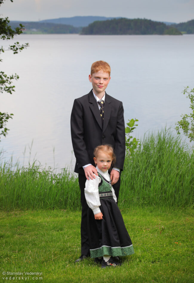 Family photo children after confirmation in the park in bunad, Sarpsborg